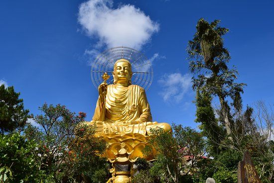 Gylden Buddha-statue